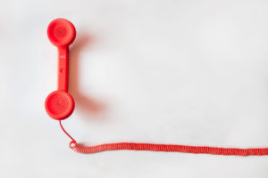 red phone on white background
