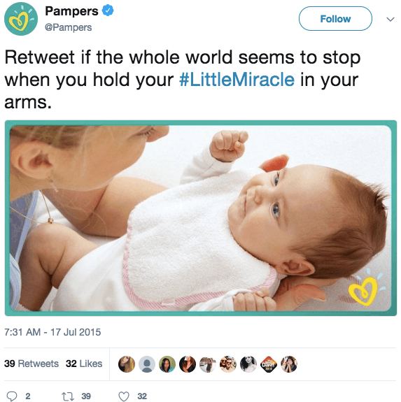 pampers tweet with mom holding a baby